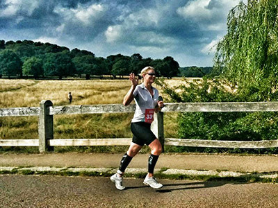 woman running in countryside